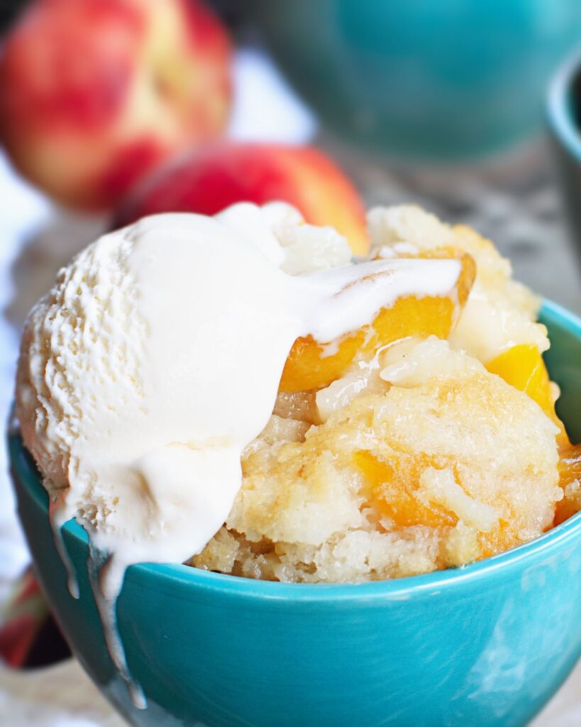 peach cobbler with vanilla ice cream in bowl fresh peach cobbler recipe